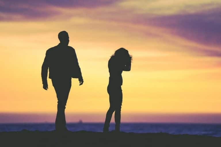 Couple In Distress By Seaside