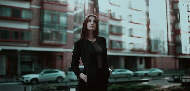 Woman Standing In City Street