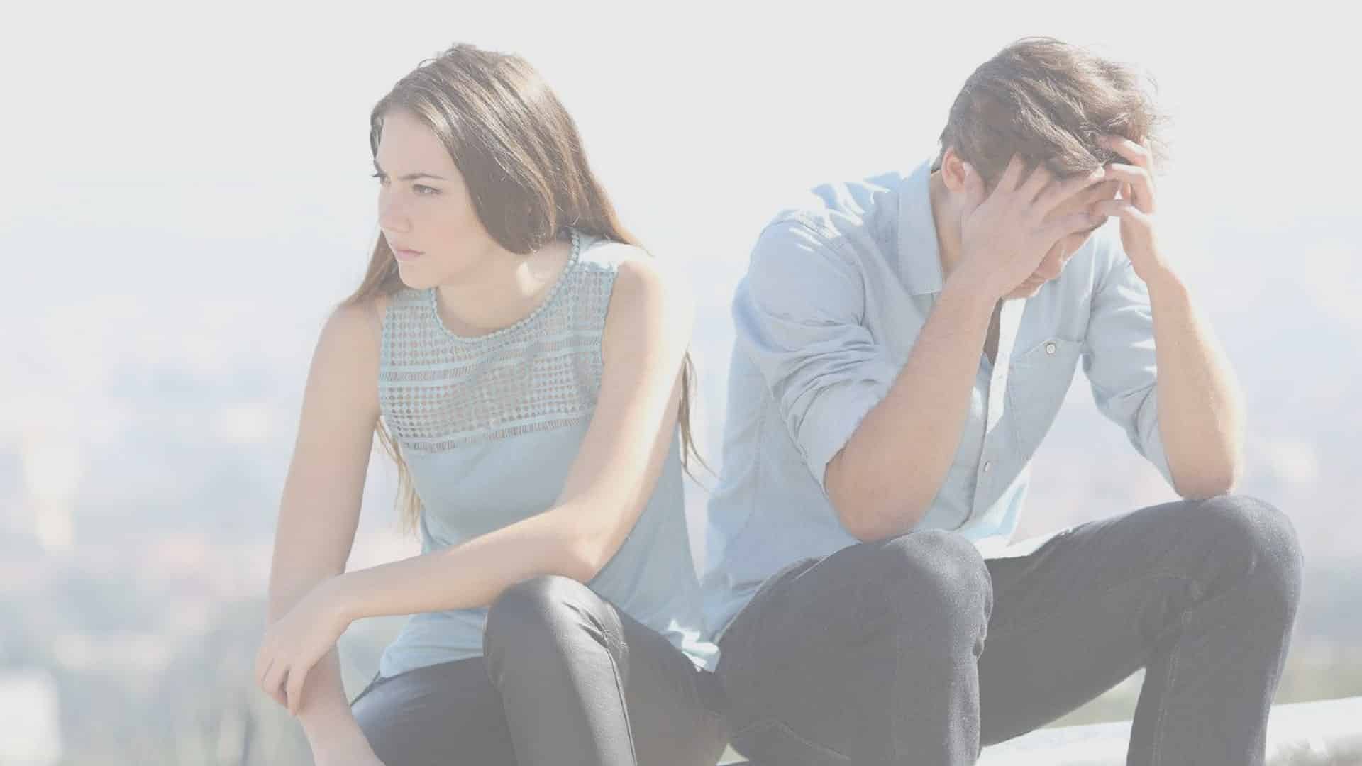 Couple Sitting In Distress