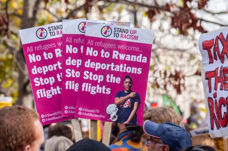 No to Rwanda deportations placards