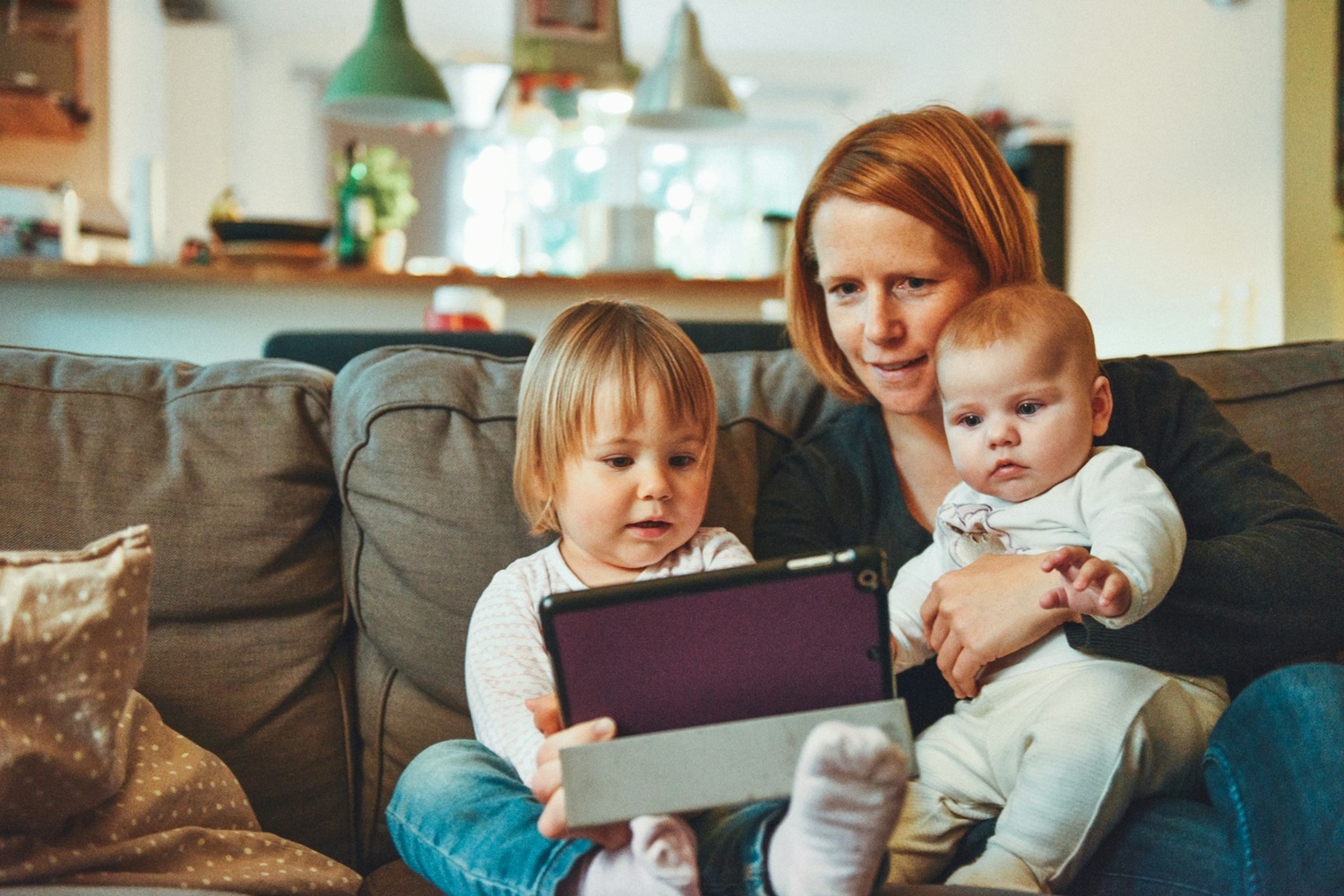 Mother and Children on Sofa