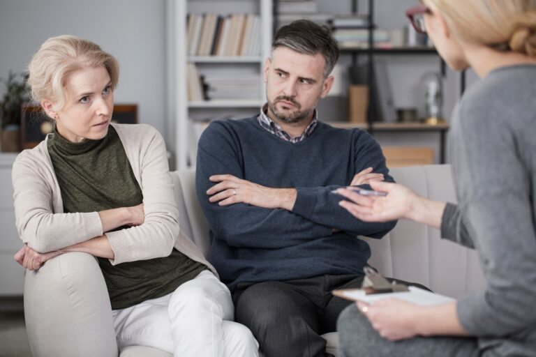 Couple talking to a divorce mediator