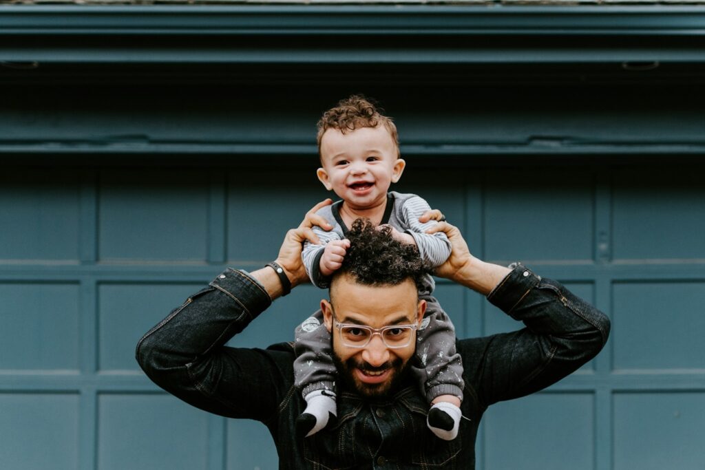 Son On Father's Shoulders