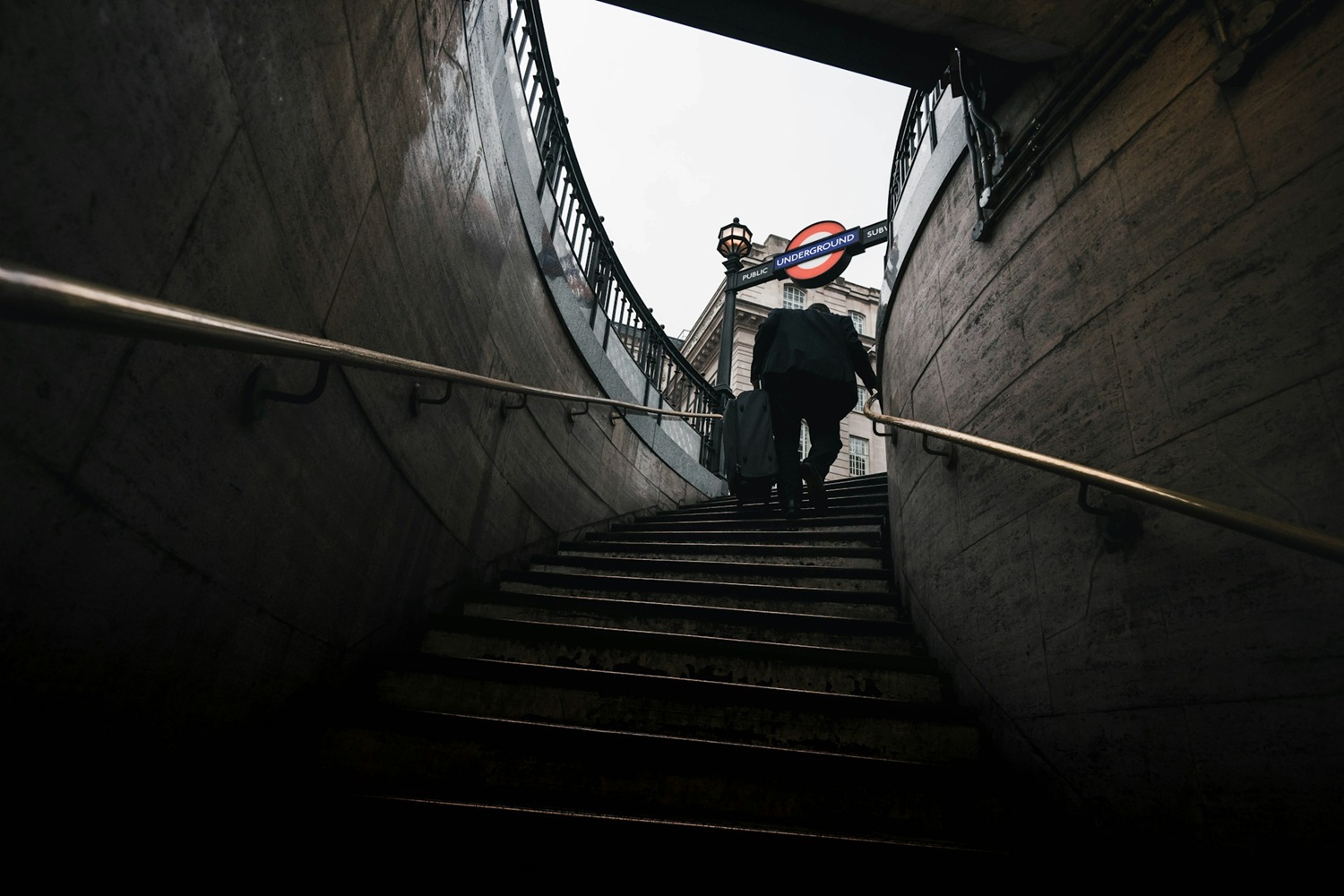 Businessman Leaving London Underground