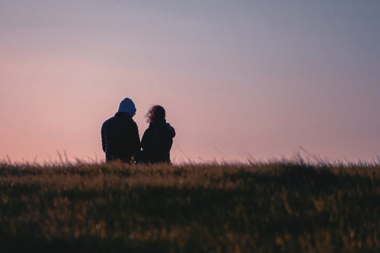 Couple Reconciling on Hilltop