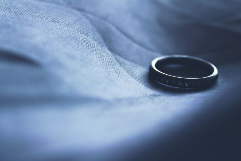 Wedding Ring On Bed