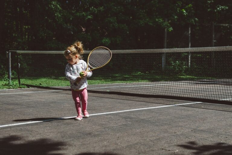 Child Playing Tennis