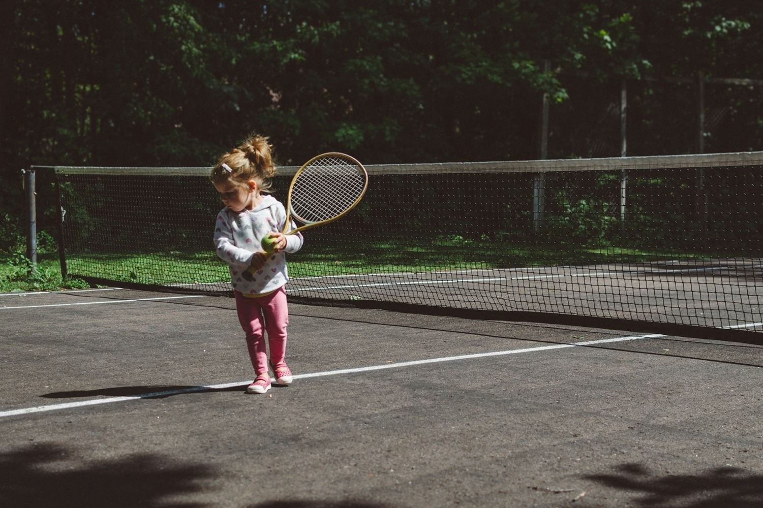 Child Playing Tennis