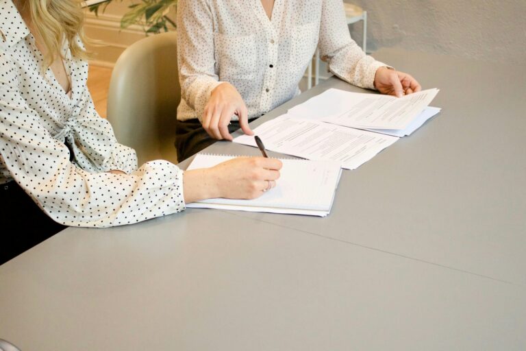 Completeing Financial Settlement Agreement Paperwork With Solicitor