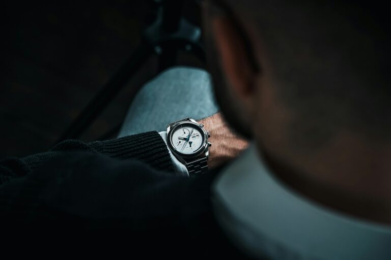 Man Checking Time On Watch