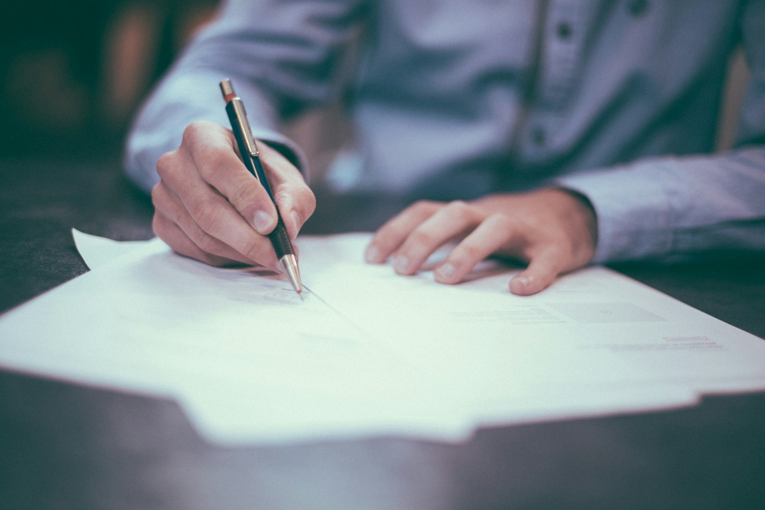 Man Completing A D81 Form