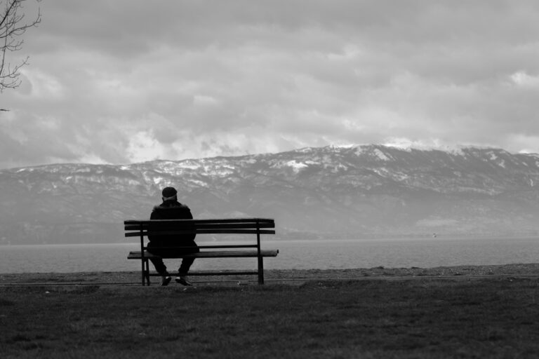 man alone on bench