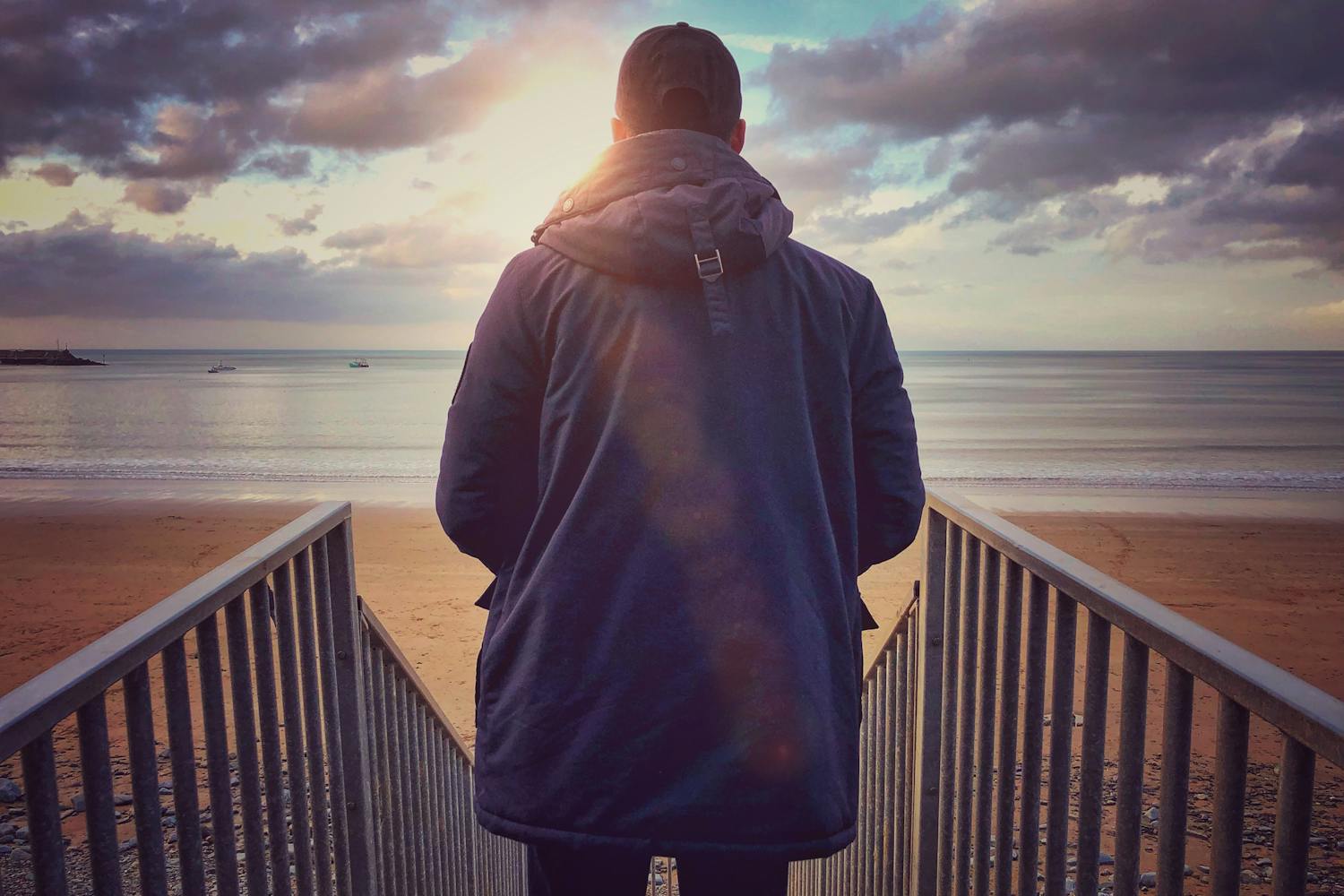 Man Arriving at British Beach