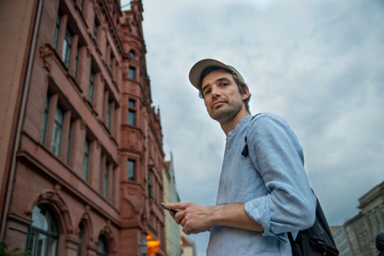 Man on Street With Dual Citizenship