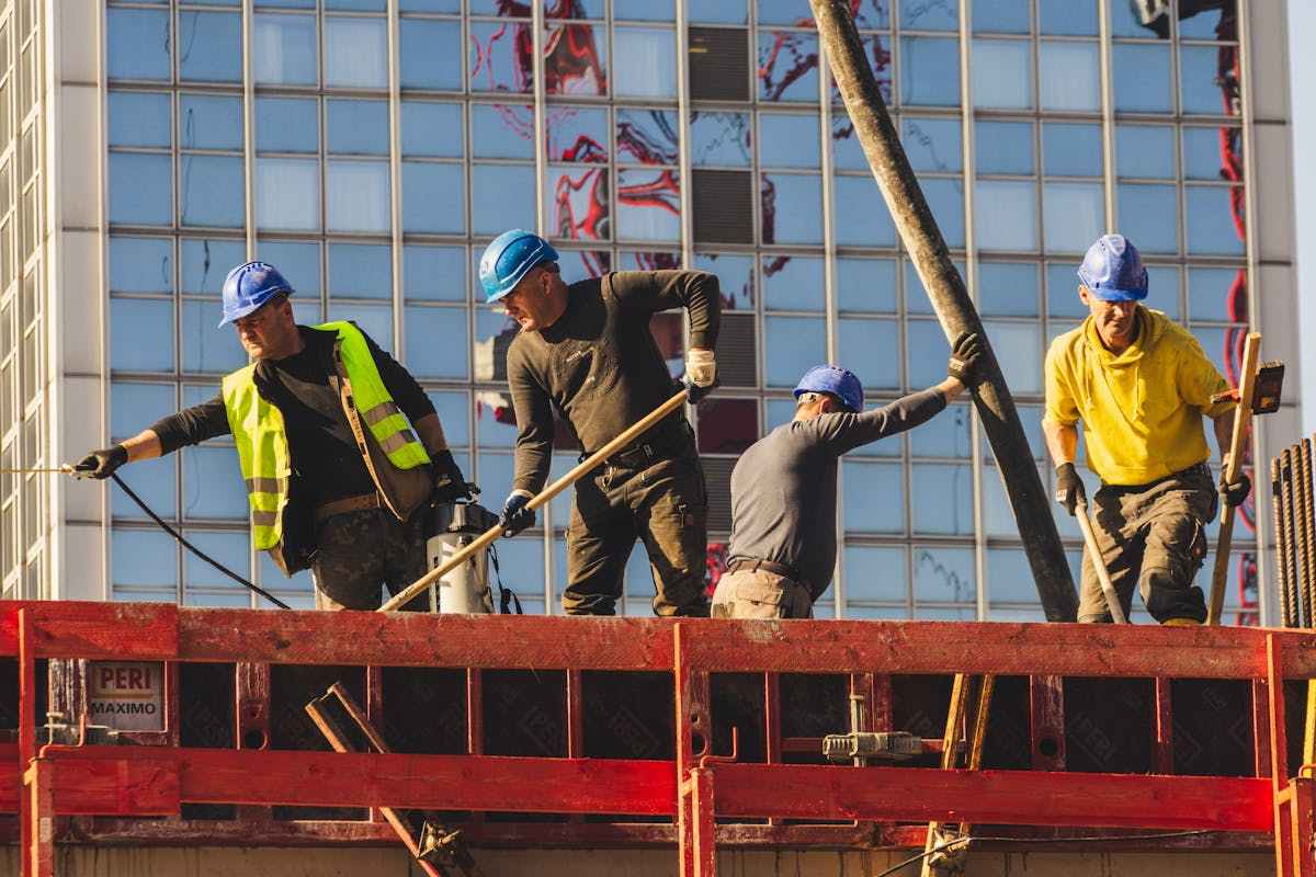 Construction workers on a high-rise building site