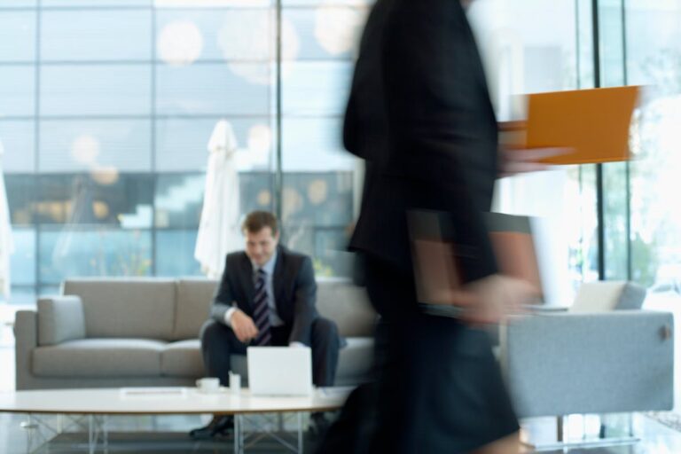 business woman reviewing breach of contract claim