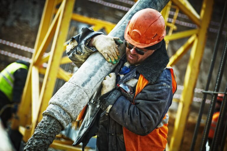 builder pouring concrete