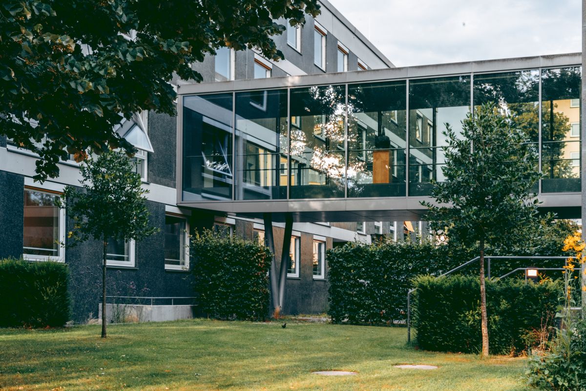 contemporary architecture with a connecting glass walkway