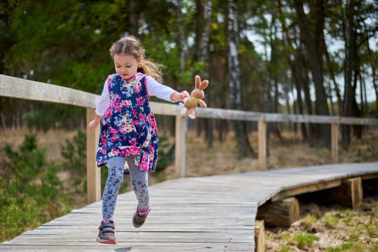 girl in a floral dress running