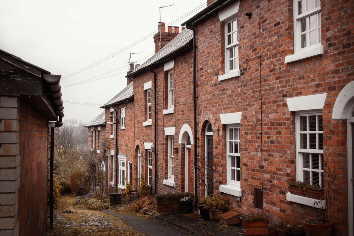 traditional brick houses lining a quaint alley in Shrewsbury, England