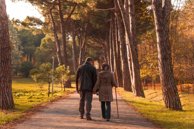 elderly couple walking